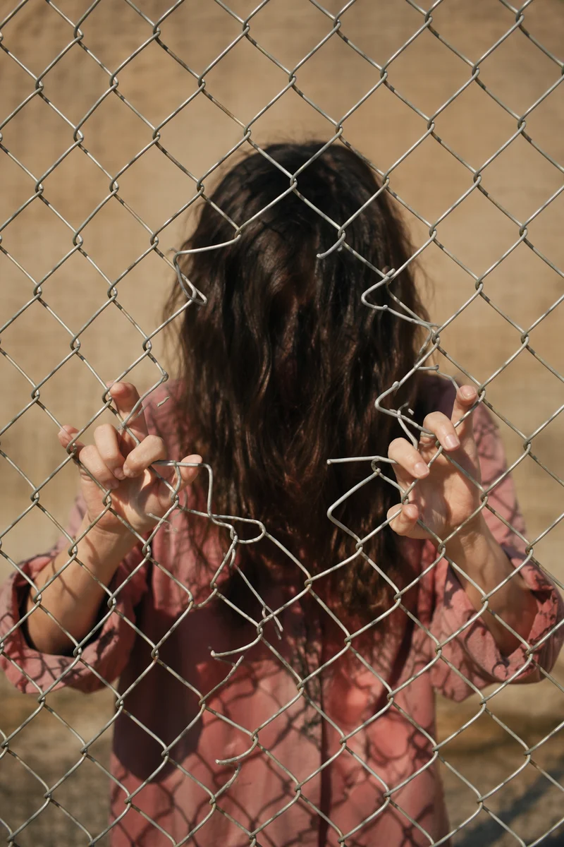 Broken Chains at the Fence of Freedom
