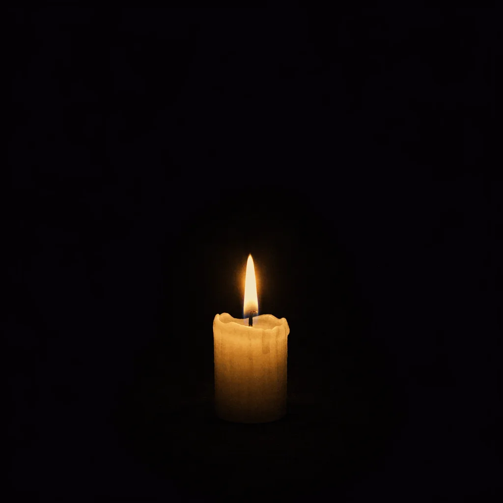 Single Candle Flame in Quiet Faith