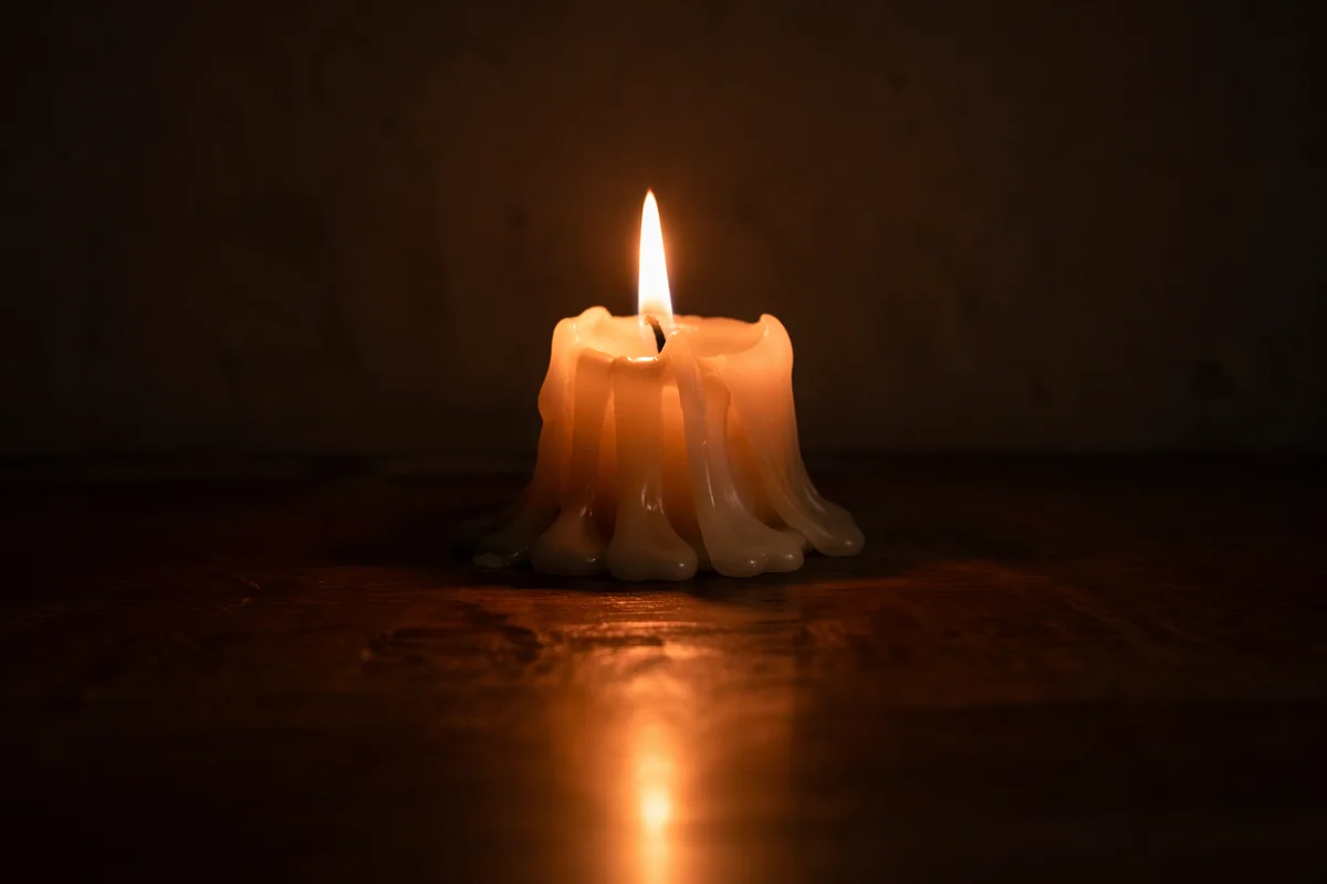 Burning Candle of Faith in Darkness
