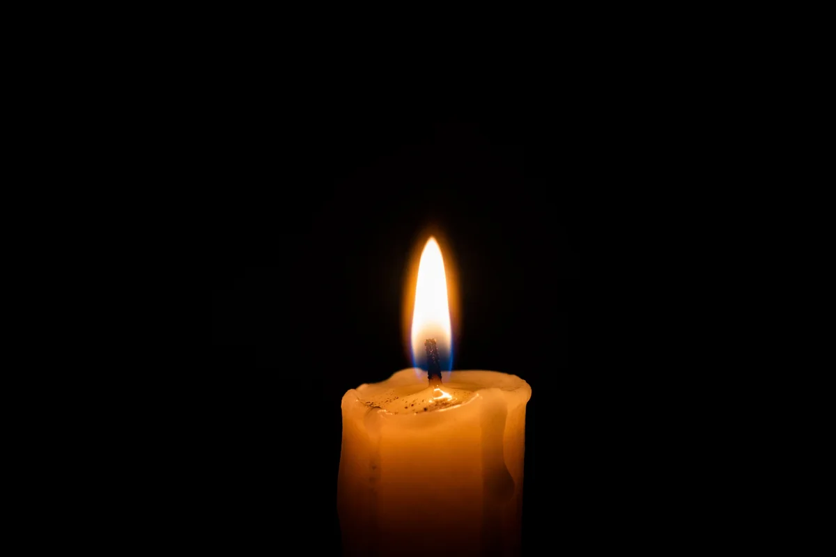 Burning Beeswax Candle of Quiet Faith