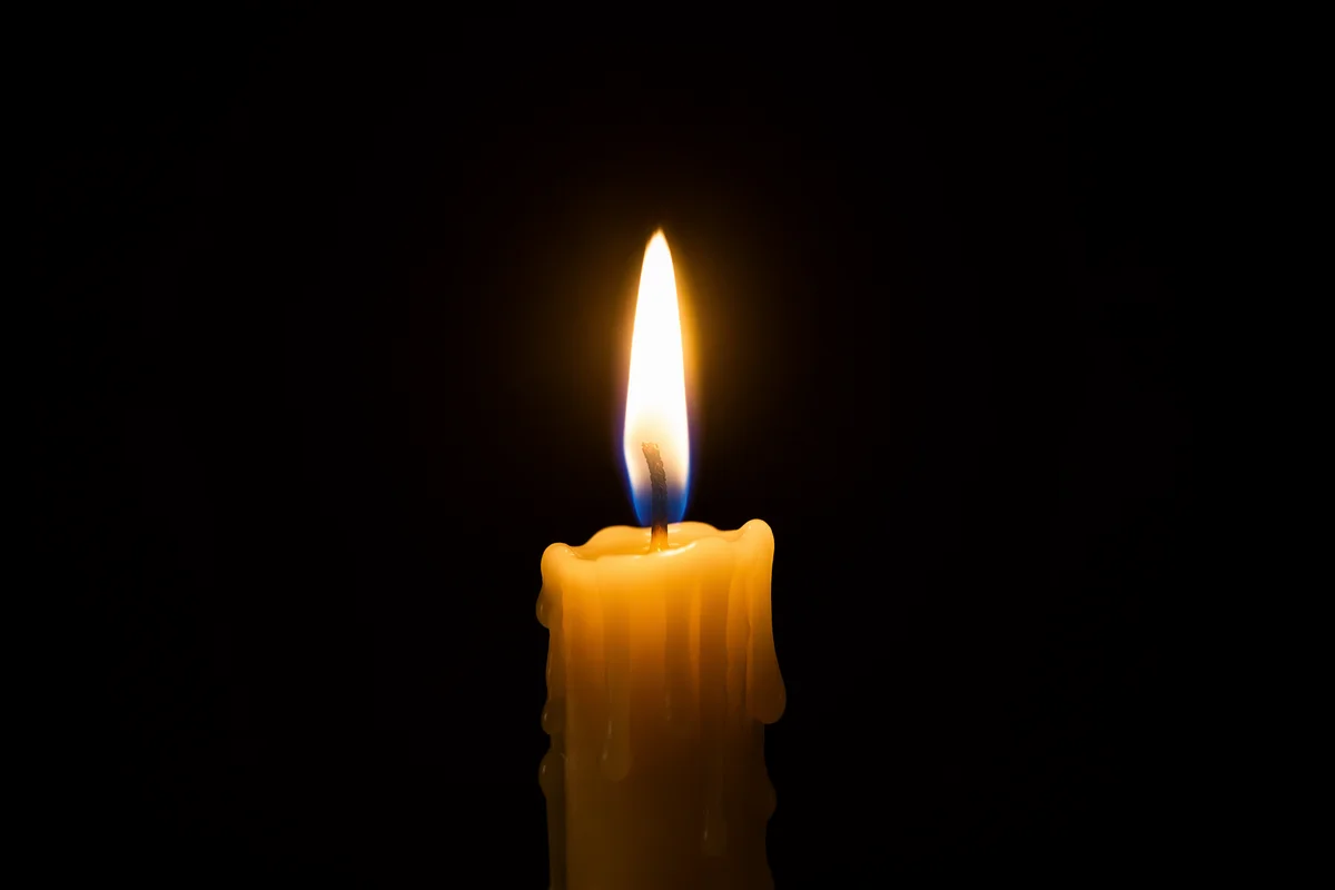 Burning Candle in Darkness for Faith