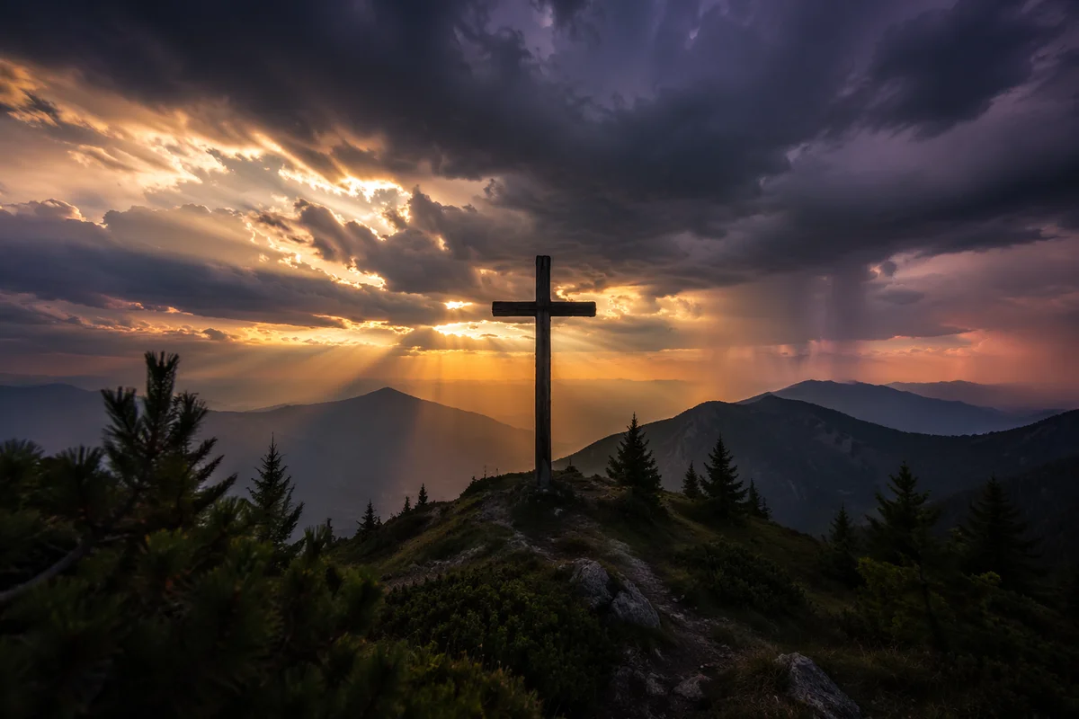 Wooden Cross Beneath Stormy Mountain Light