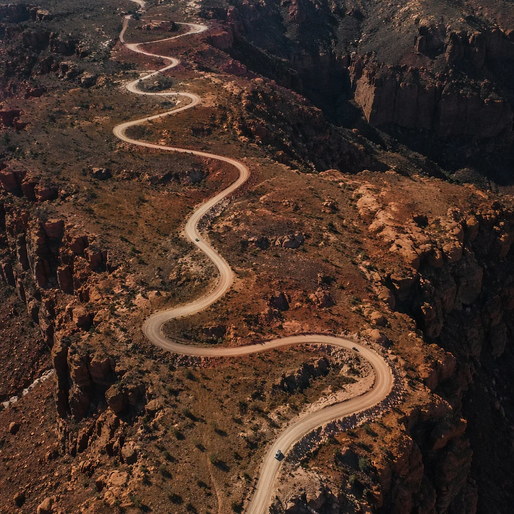 Winding Desert Road Through Rugged Canyon