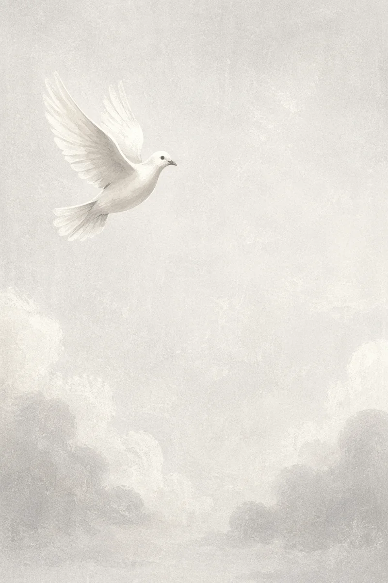 White Dove Flying Through Peaceful Gray Sky