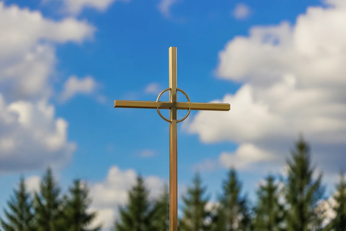 Golden Cross Under Blue Clouded Sky