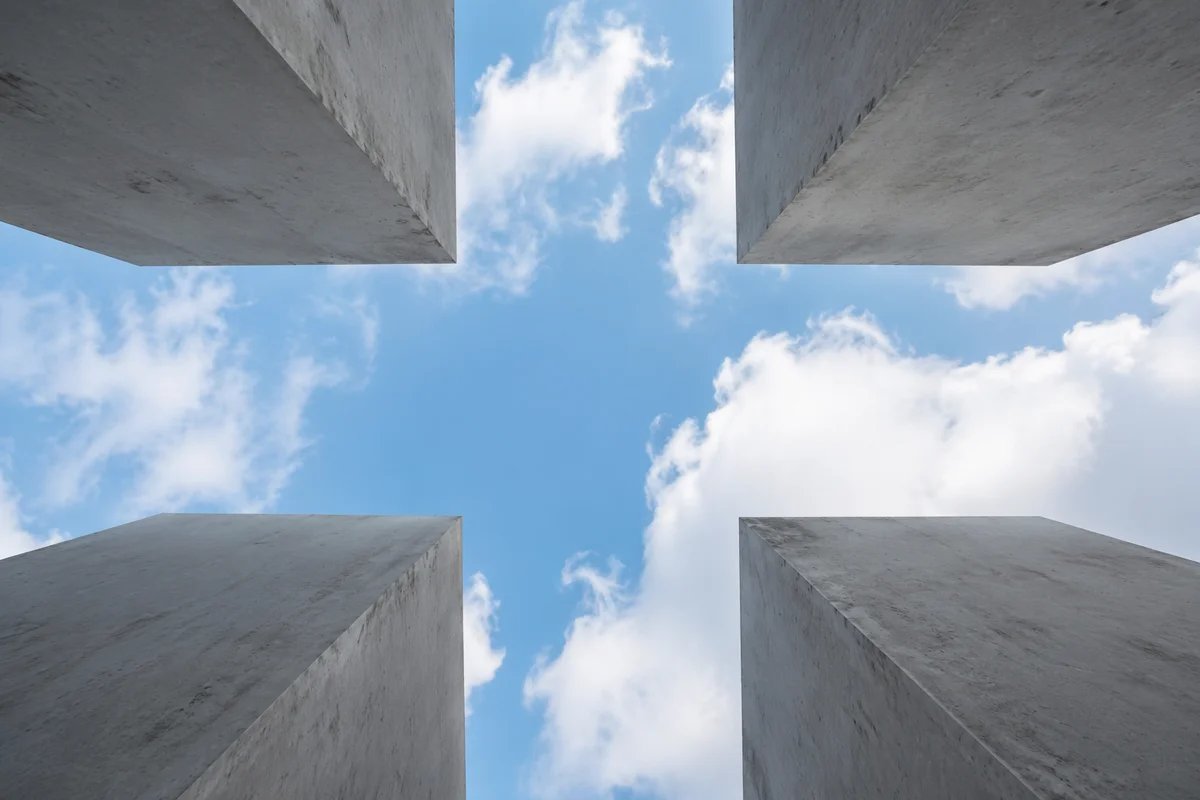 Empty Cross Framed by Blue Sky