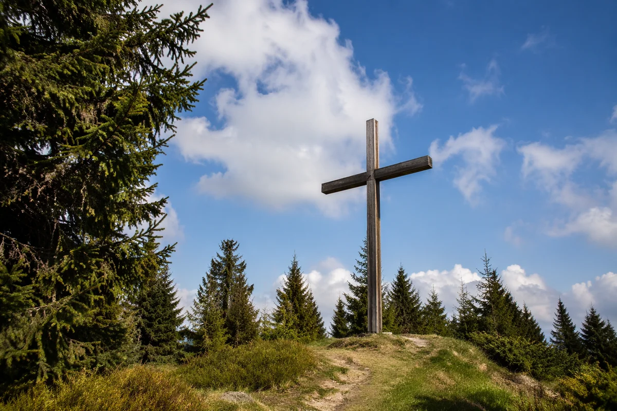 Empty Wooden Cross Under Blue Sky