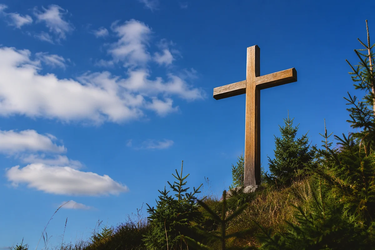 Empty Wooden Cross Beneath Blue Sky