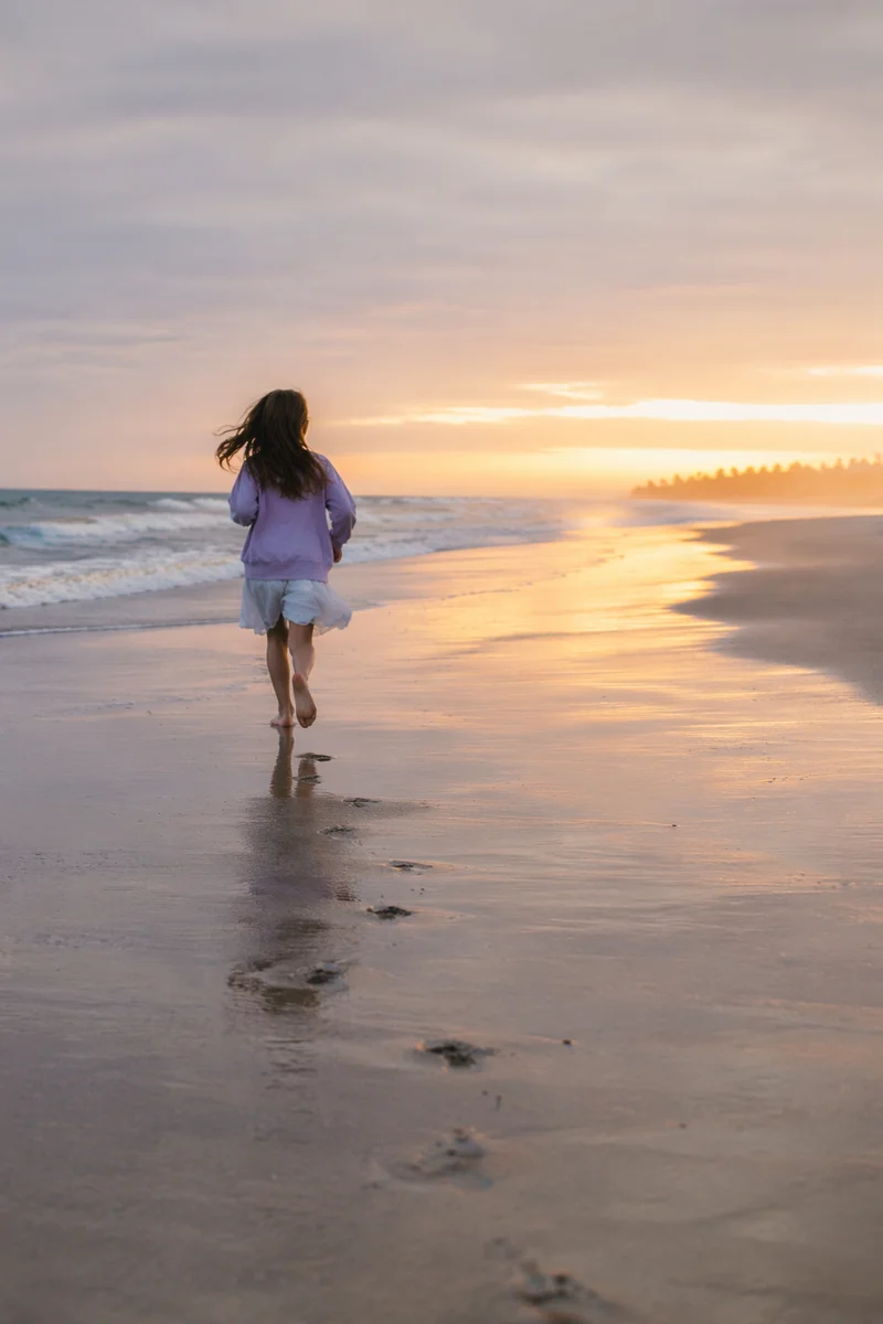 Footprints on Sunrise Shoreline