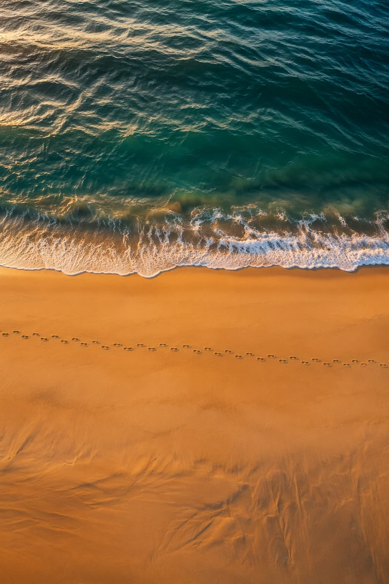 Footprints Along Sunrise Beach Shoreline