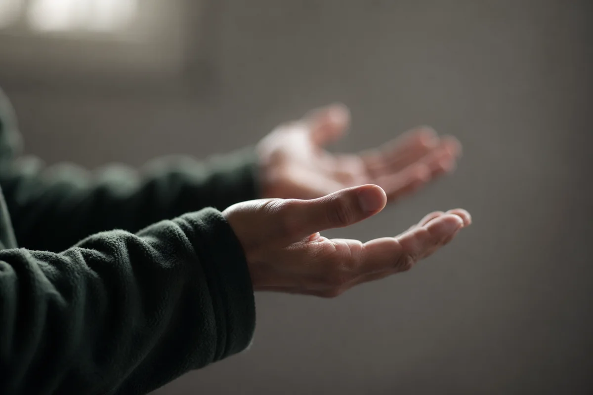 Open Hands in Soft Prayer Light