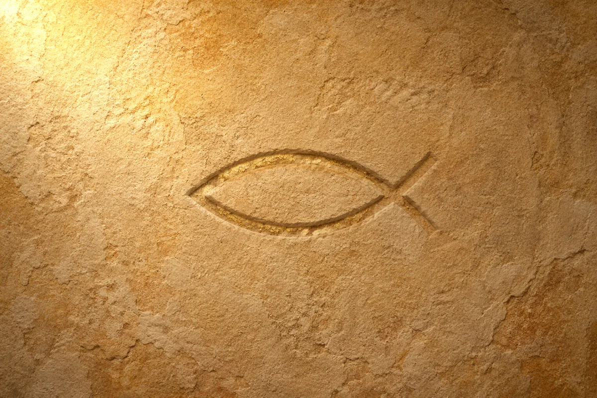 Ancient Ichthys Carving in Warm Sandstone
