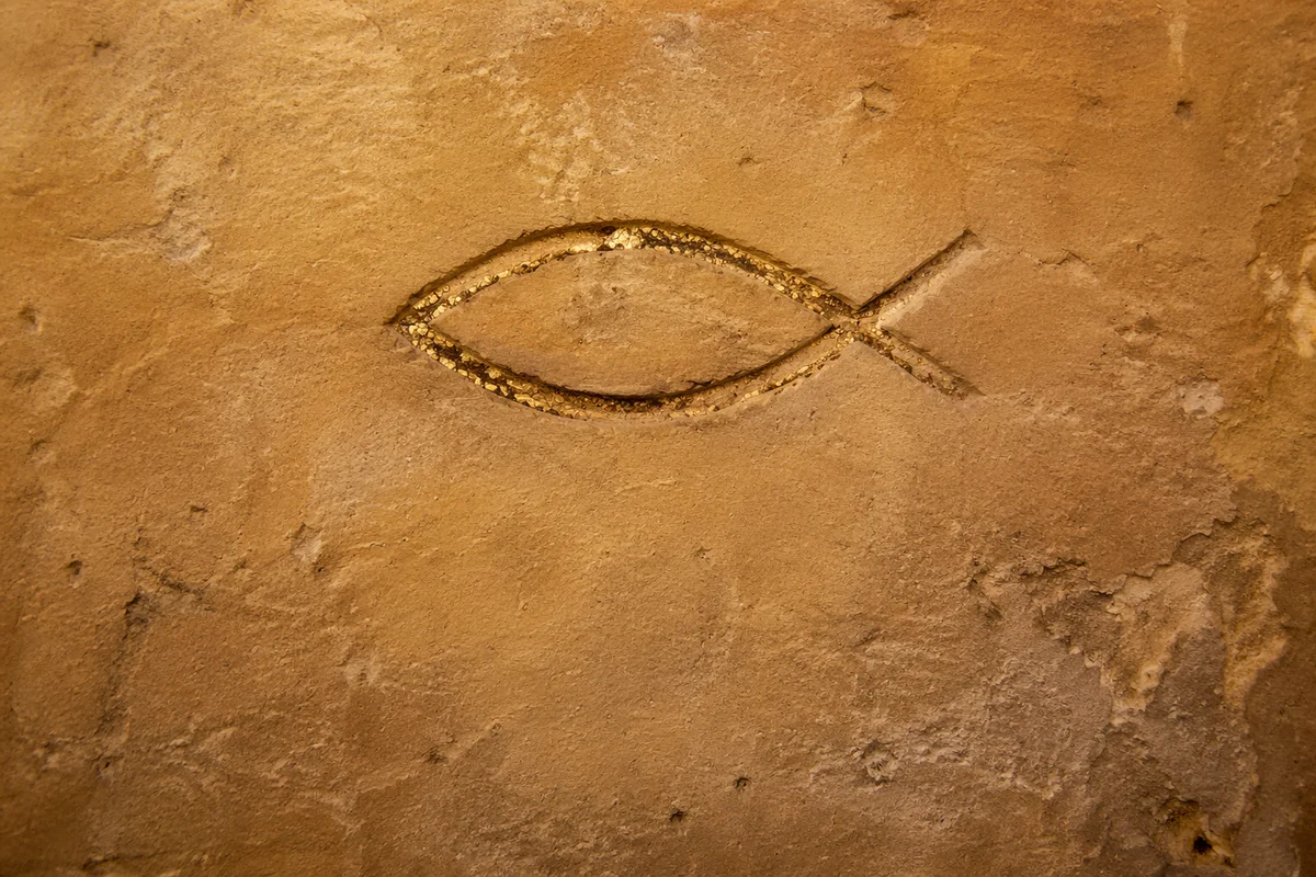 Ancient Ichthys Carving on Sandstone Wall