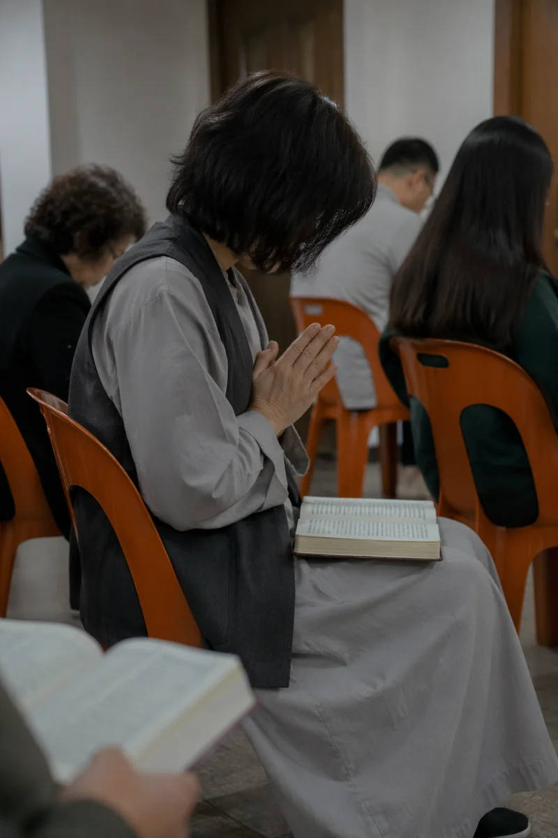 Quiet Intercessory Prayer Circle in Community Hall
