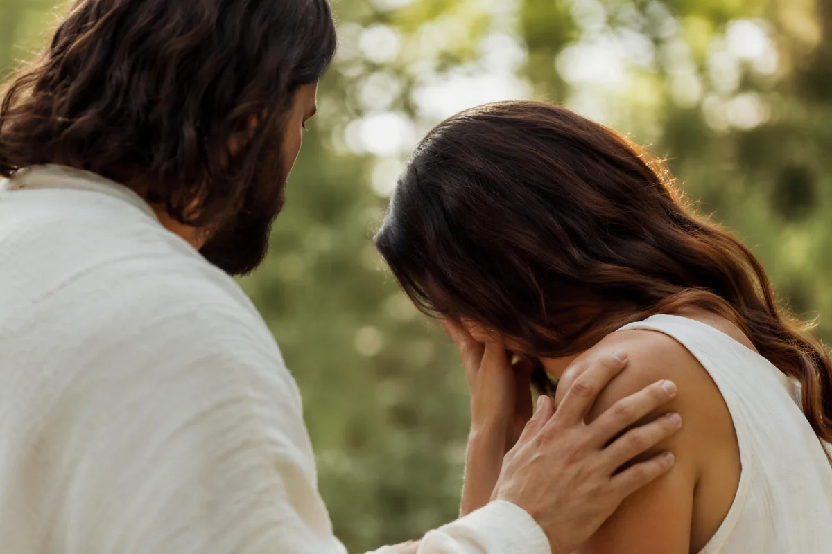 Jesus Comforting Crying Woman in Evergreen Garden