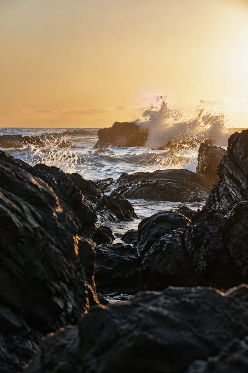 Sunrise Waves Crashing on Volcanic Rocks