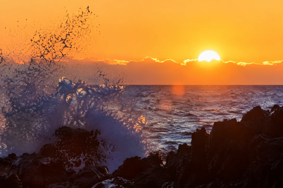 Ocean Waves Crashing at Golden Sunrise