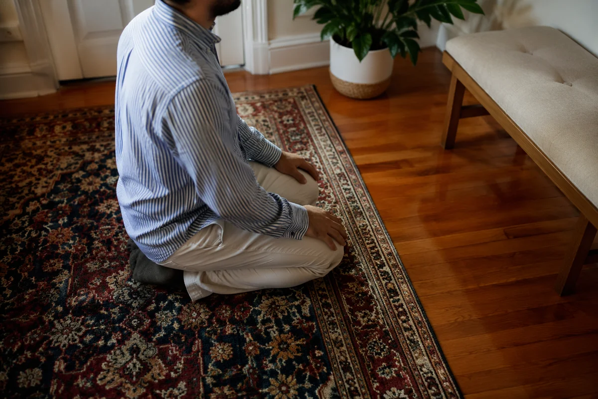 Quiet Kneeling Prayer in Cozy Home