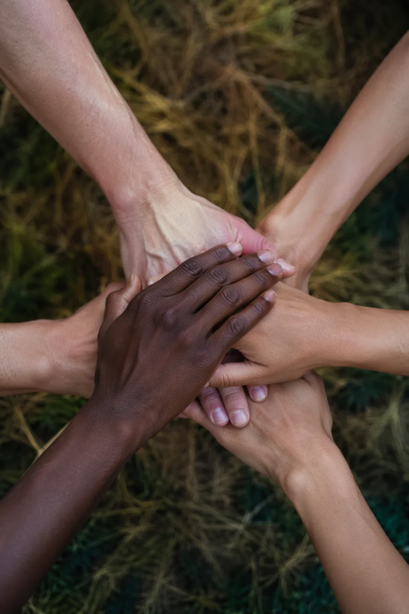 Prayer Group Hands Joined in Unity