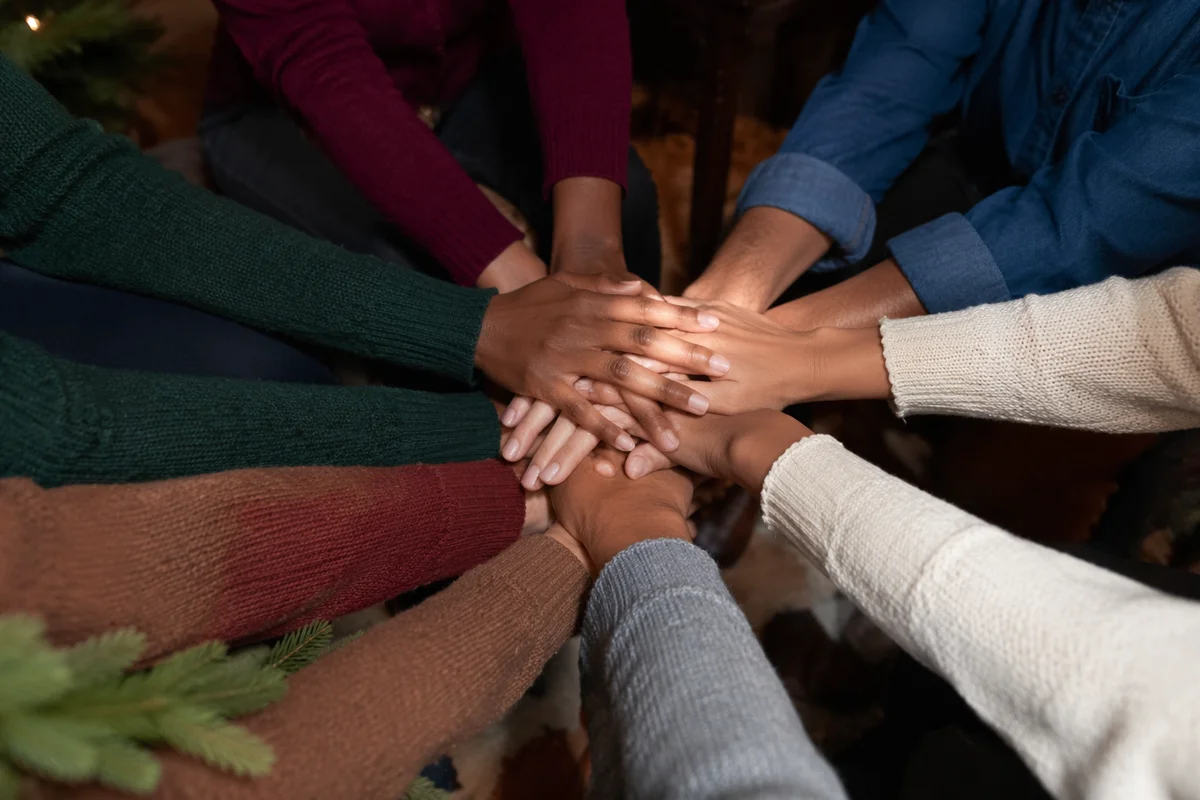 Prayer Group Hands Joined in Unity
