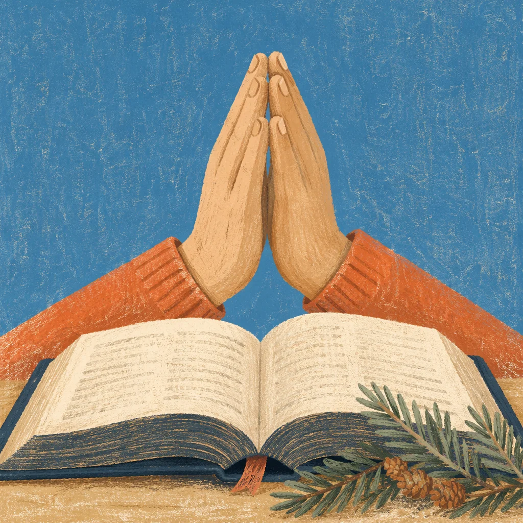 Praying Hands Above Bible With Evergreen