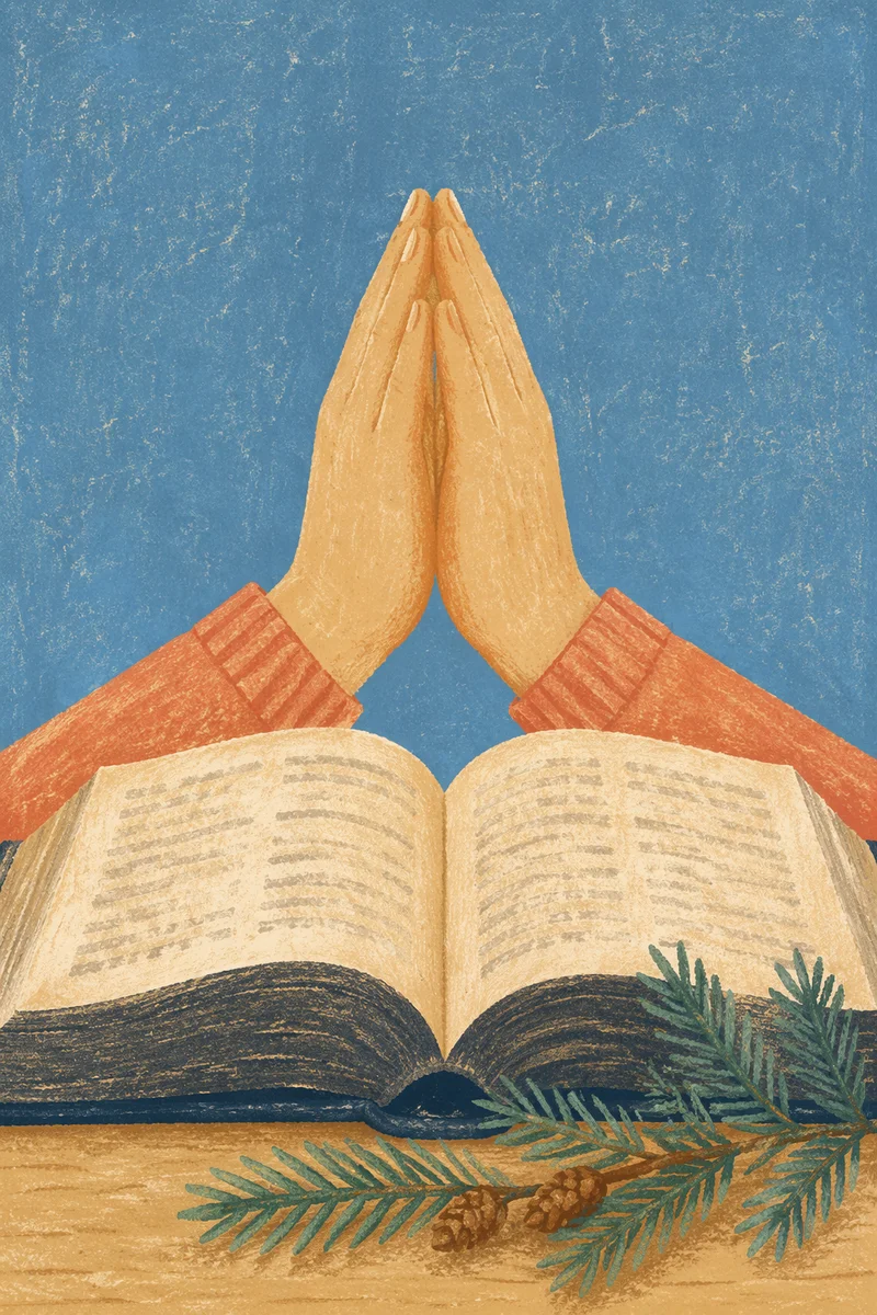 Praying Hands Over Bible With Evergreen