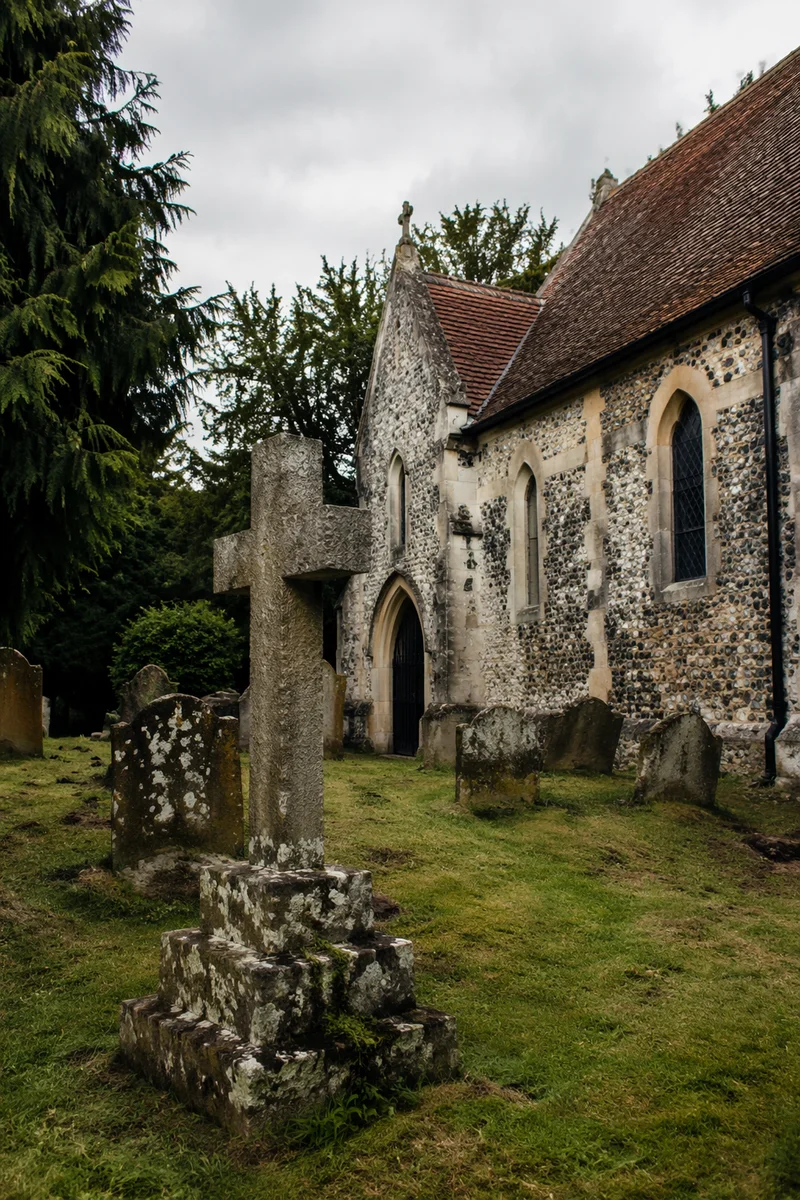 Weathered Stone Cross in Rural Cemetery