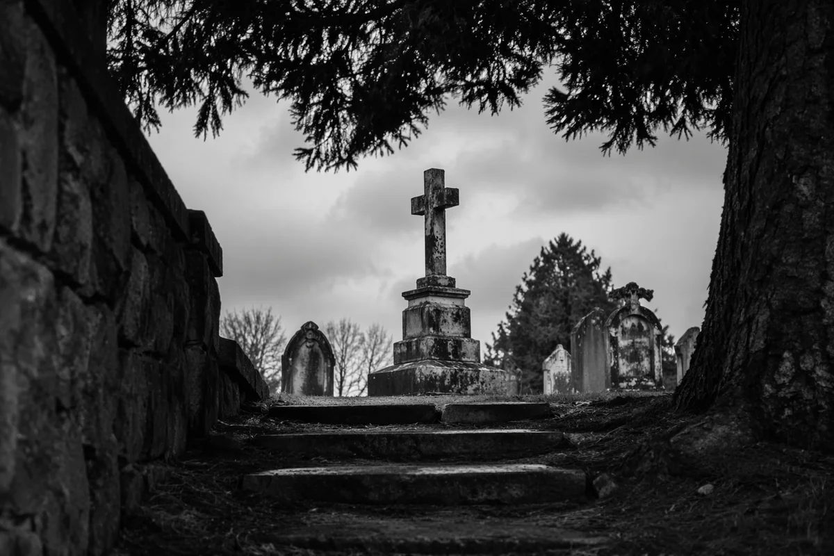Weathered Stone Cross in Evergreen Cemetery