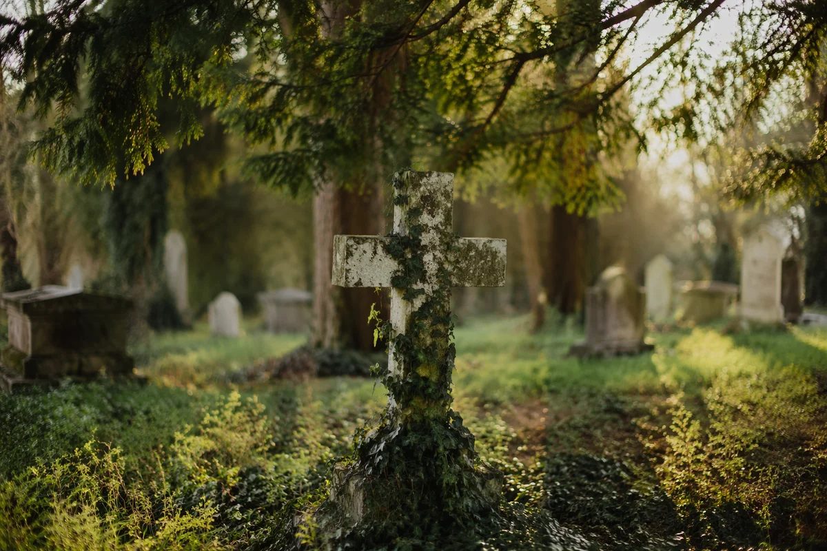 Weathered Stone Cross in Evergreen Cemetery