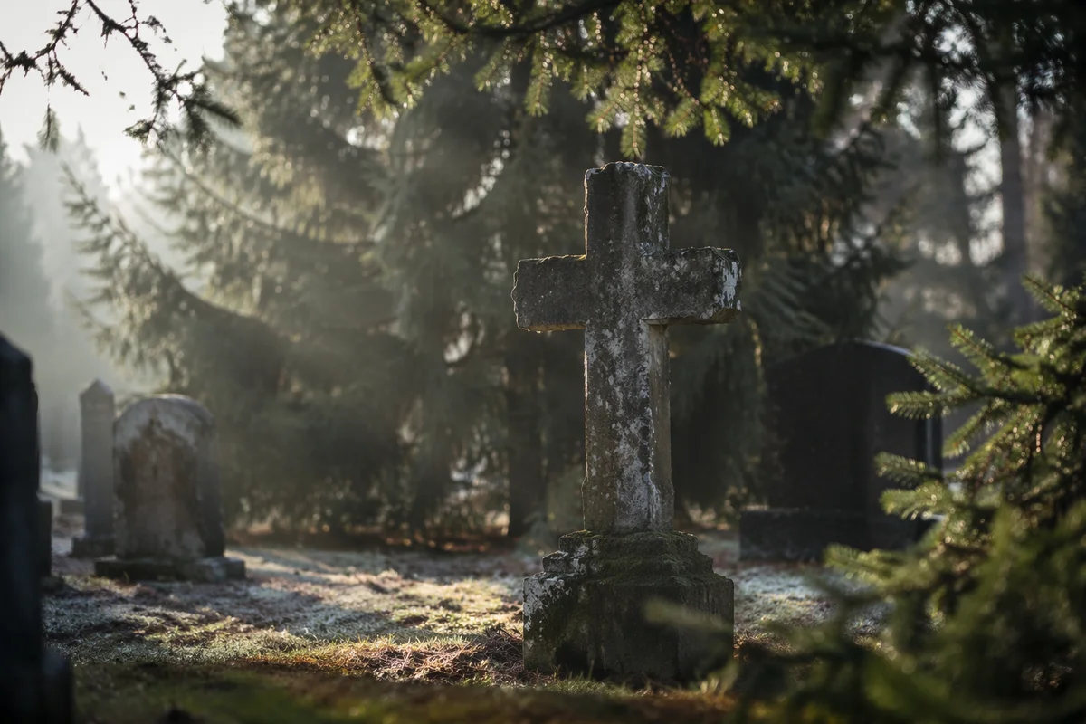 Weathered Stone Cross in Evergreen Cemetery