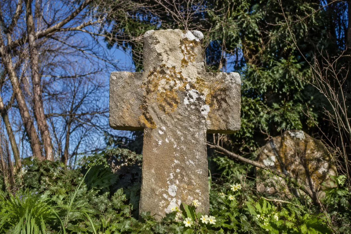Weathered Stone Cross in Evergreen Cemetery