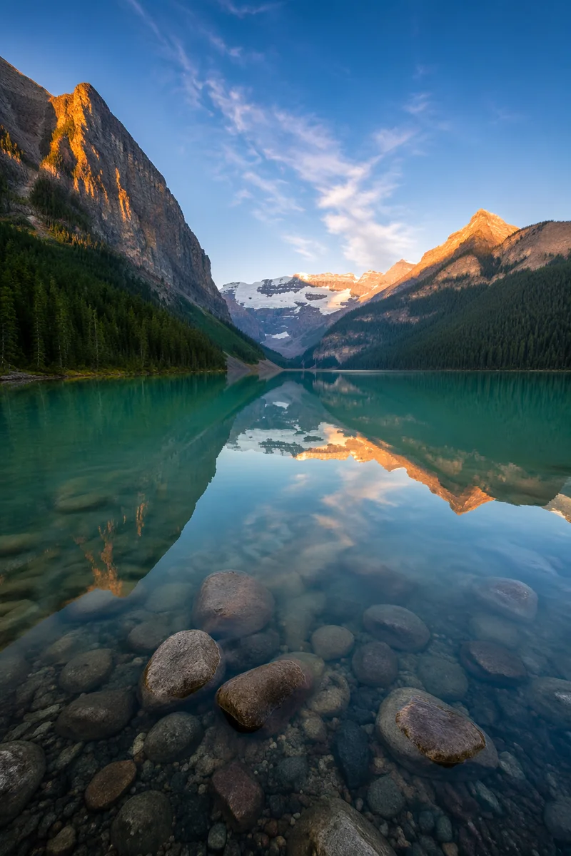 Golden Sunrise Over Evergreen Alpine Lake