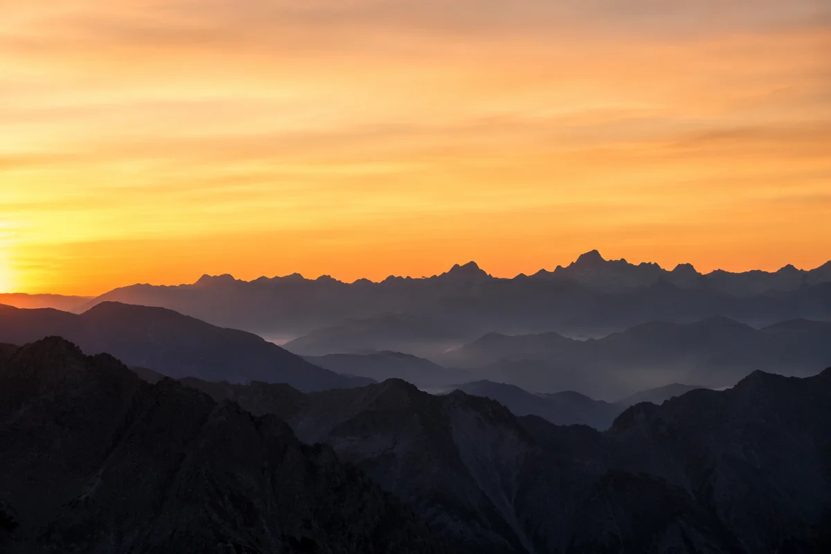 Golden Sunrise Over Remote Mountain Range