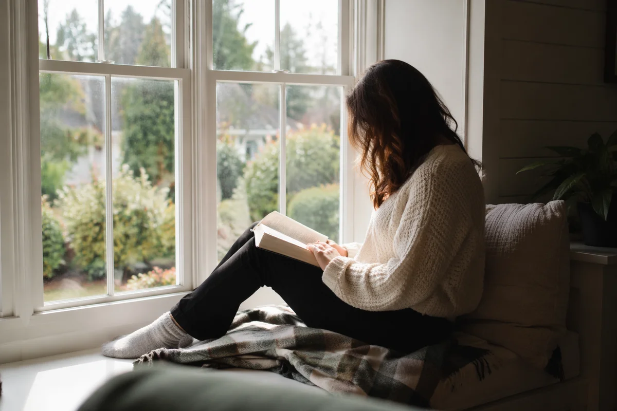 Woman Reading Bible by Morning Window