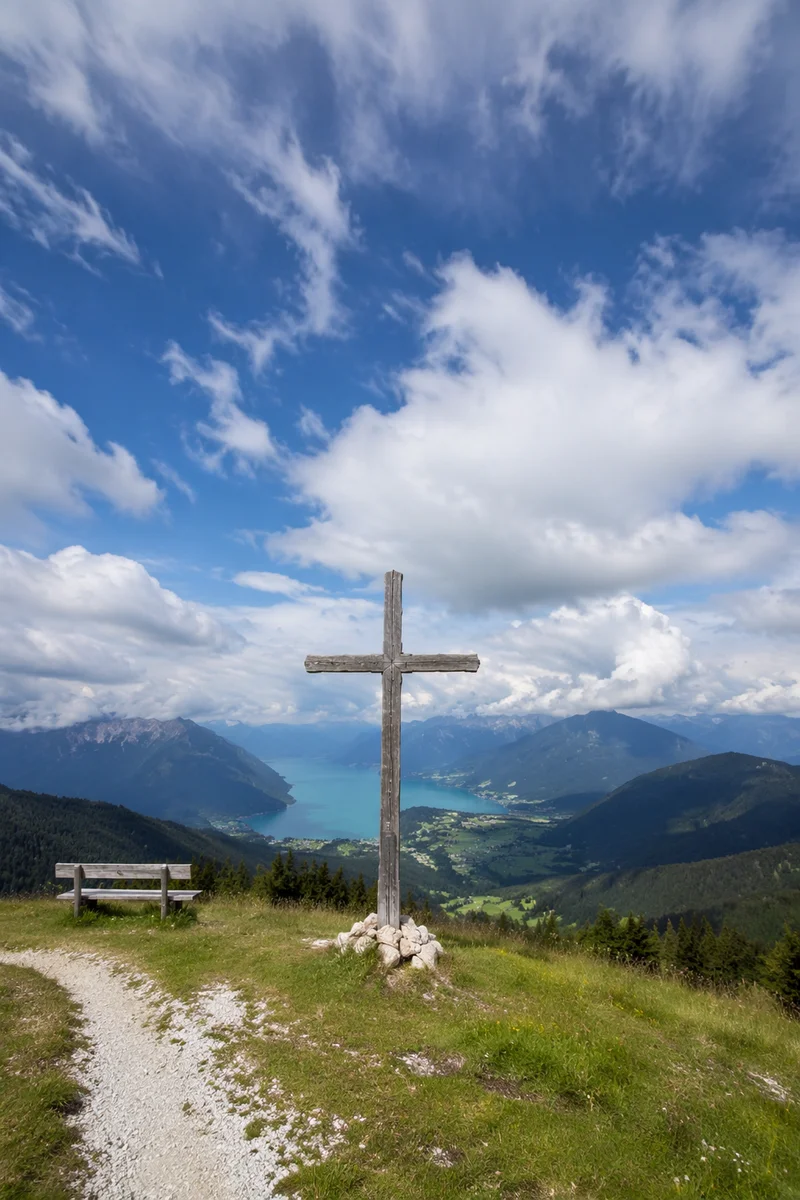 Wooden Cross on Alpine Hilltop