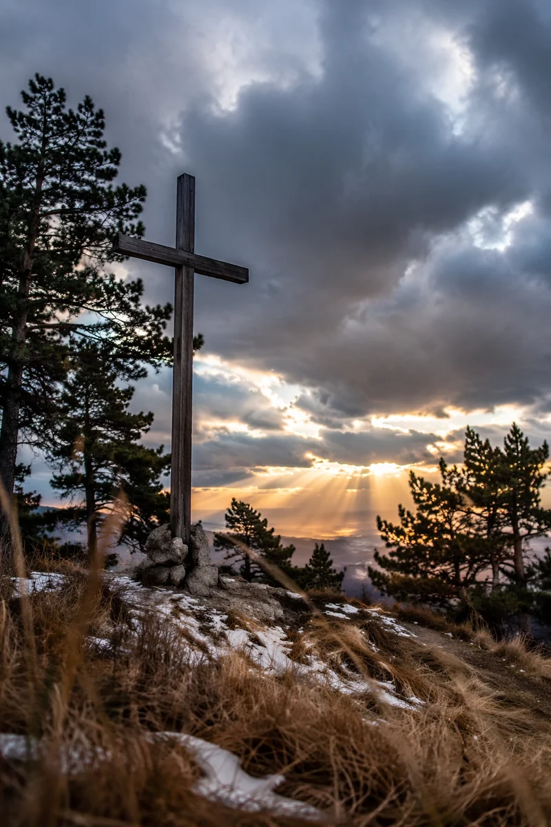 Wooden Cross on Windswept Evergreen Hilltop
