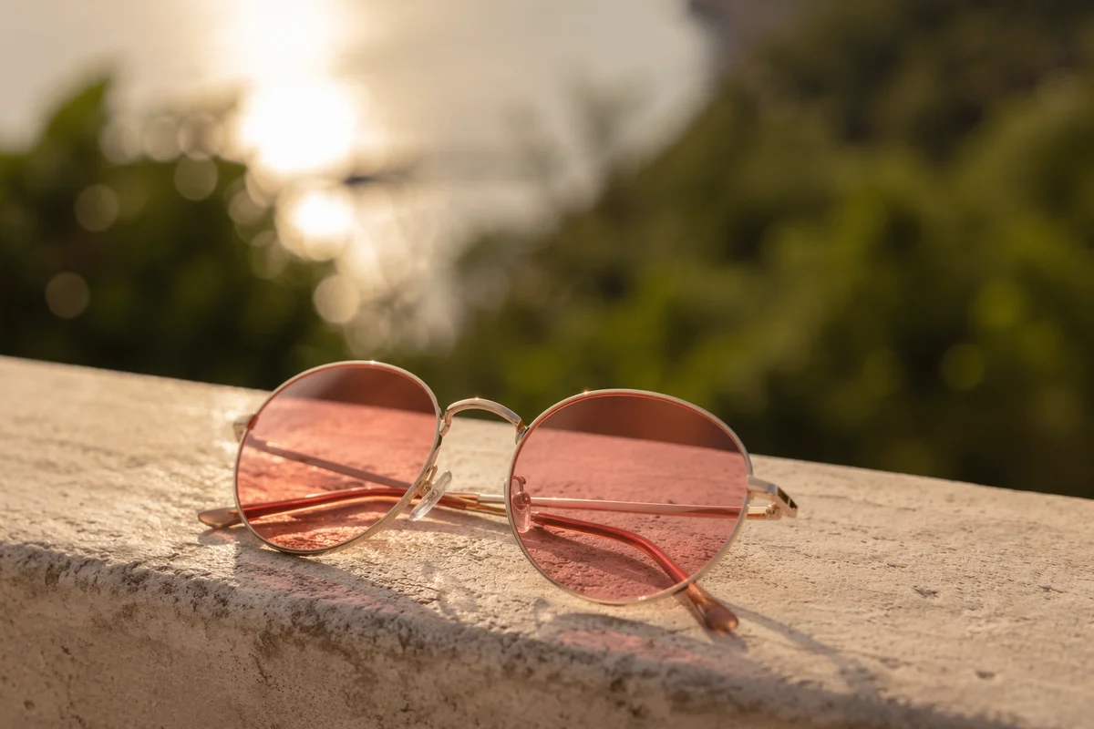 Golden Hour Coral Sunglasses Still Life