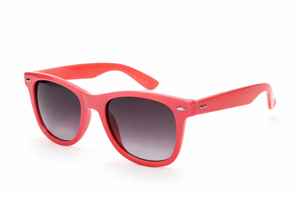 Coral Red Sunglasses on White Surface
