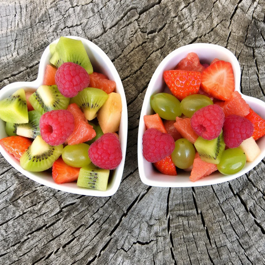 Colorful Fresh Fruit Bowls on Rustic Wood