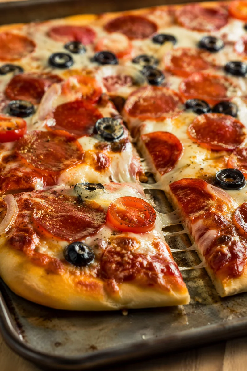 Fresh Pepperoni Pizza Slice with Melted Cheese