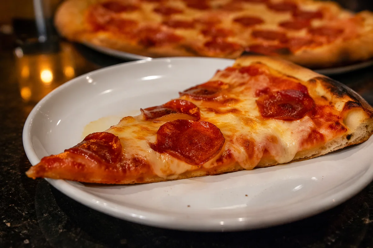 Fresh Pepperoni Pizza Slice Close-Up