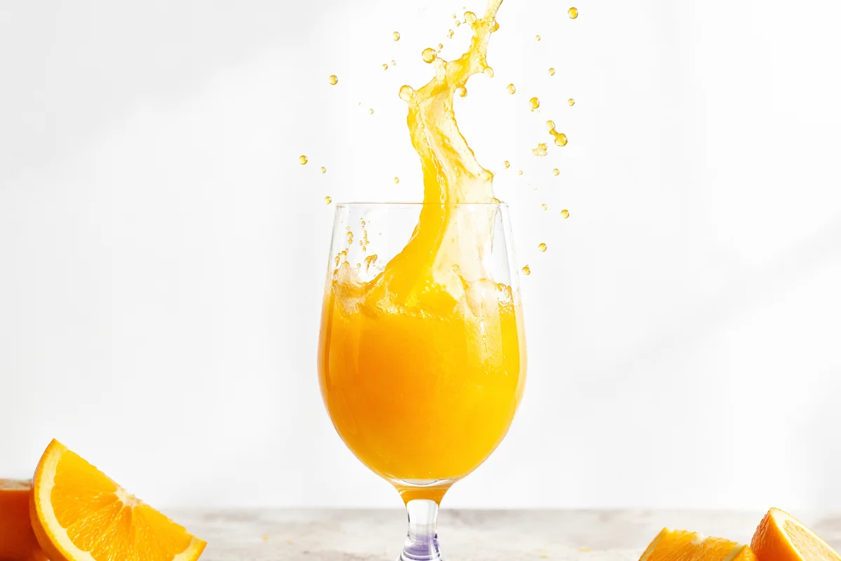 Fresh Orange Juice Splash in Glass