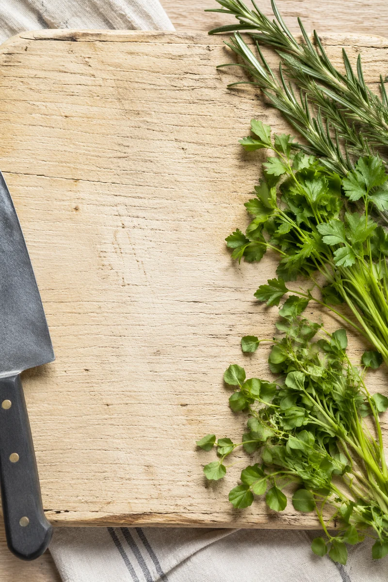 Fresh Garden Herbs on Rustic Cutting Board