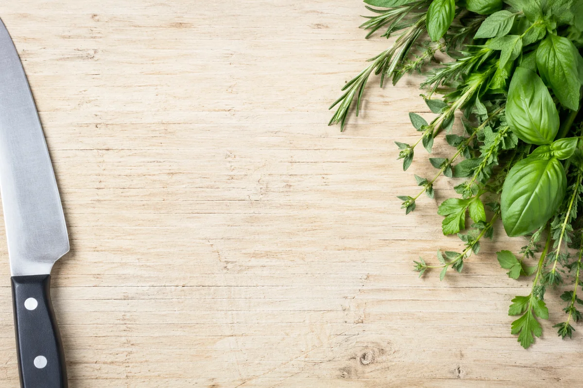 Fresh Garden Herbs on Wooden Cutting Board