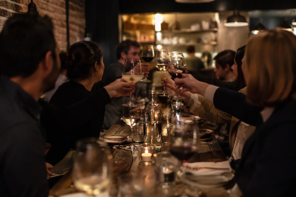 Warm Bistro Dinner Toast Celebration