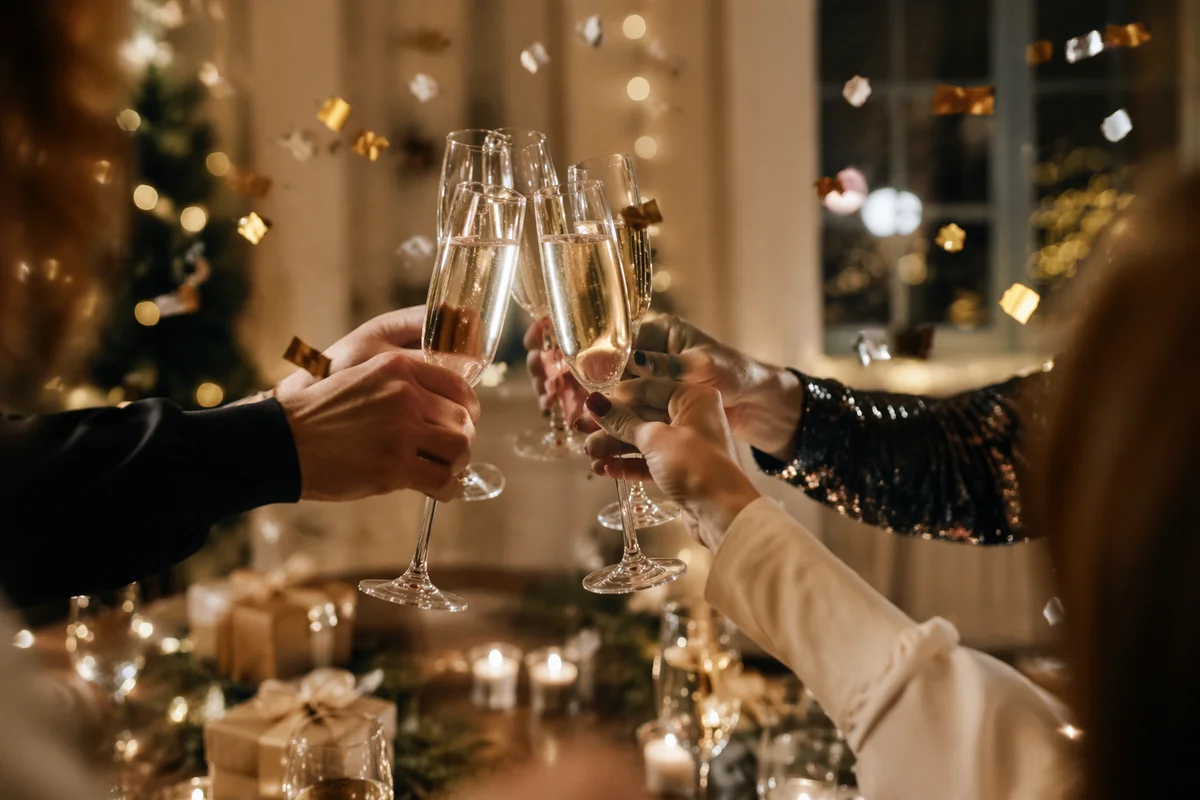 Holiday Champagne Toast with Falling Confetti