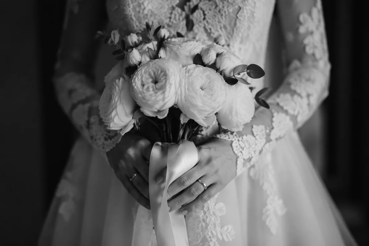 Bride Holding White Rose Wedding Bouquet