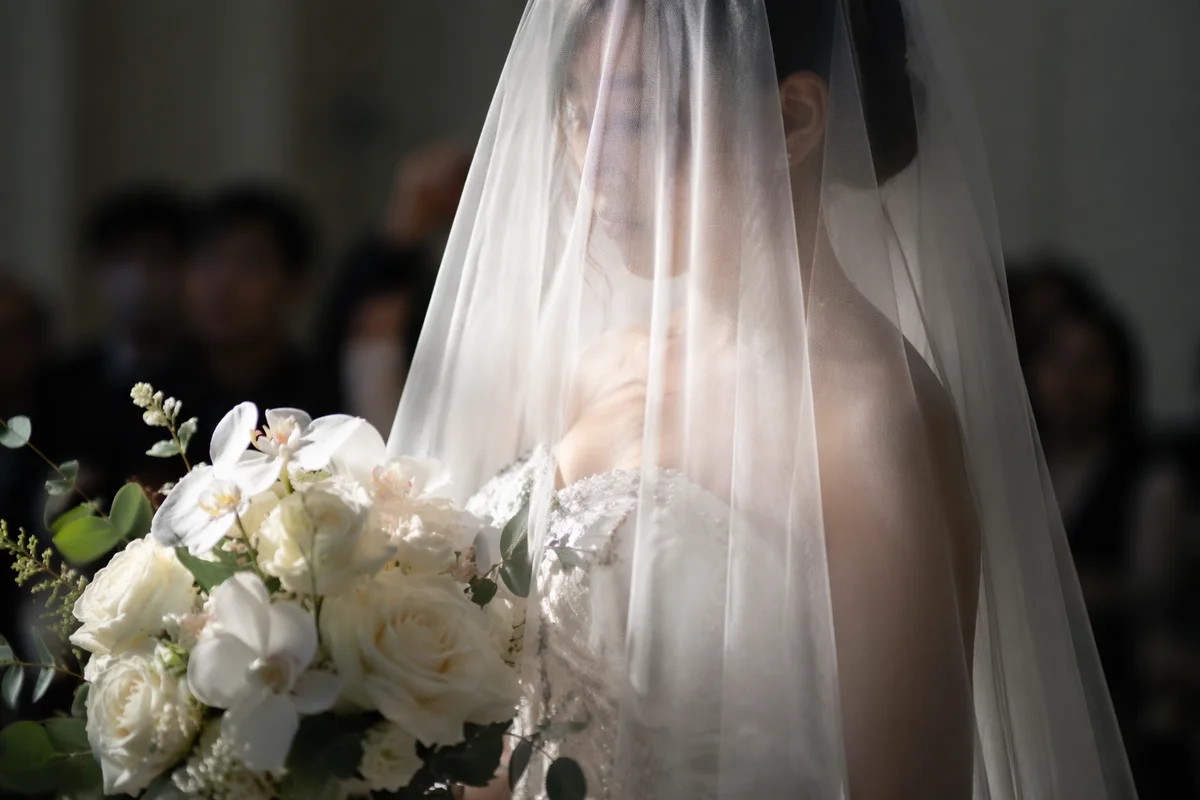 Bride Holding White Floral Wedding Bouquet
