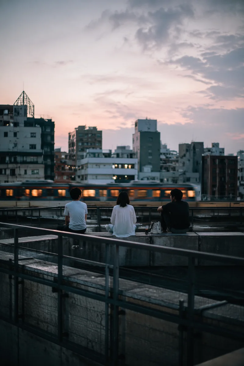 Contemplative Rooftop Terrace Over Evening Skyline