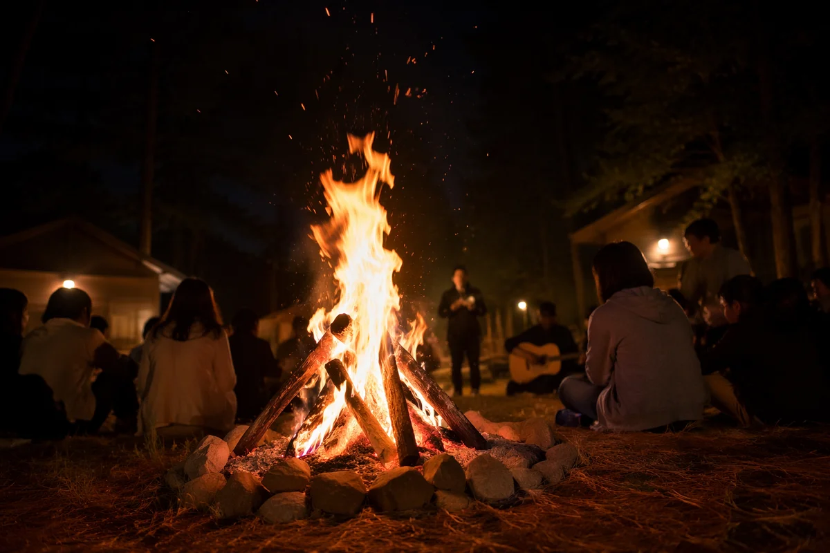 Night Campfire Gathering by Cabins